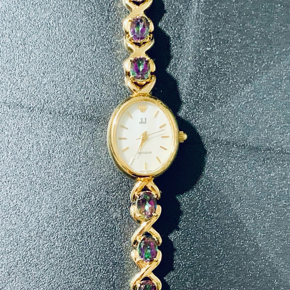 Gold Watch with Stainless Steel Back